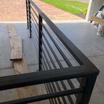 Custom steel railing section fabricated in driveway, Ocala FL